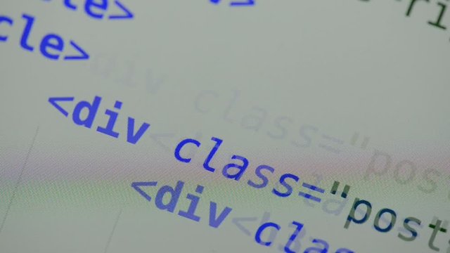 HTML and CSS code developing. Website design code programming on a laptop screen
