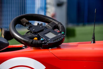 Gartenposter Single seater formula racing car steering wheel detail © fabioderby
