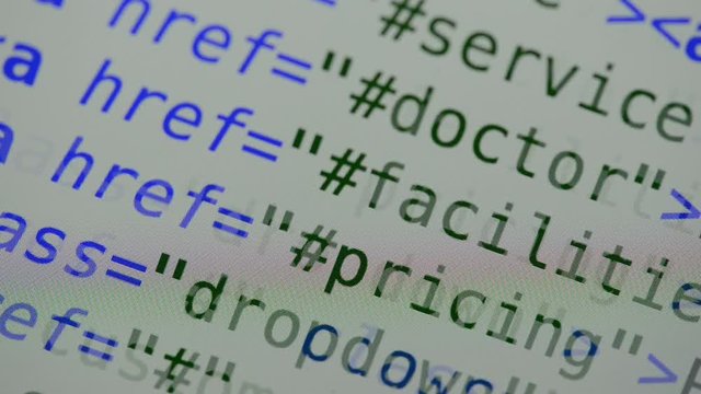 HTML and CSS code developing. Website design code programming on a laptop screen