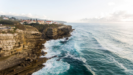 The ocean and the beautiful beach at sunset in Portugal, Azenhas do Mar
