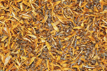 Texture background of dried flowers calendula officinalis or marigold