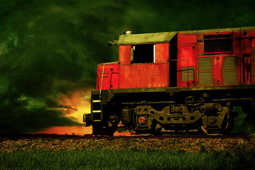 Fototapeta na wymiar A train chasing the sun