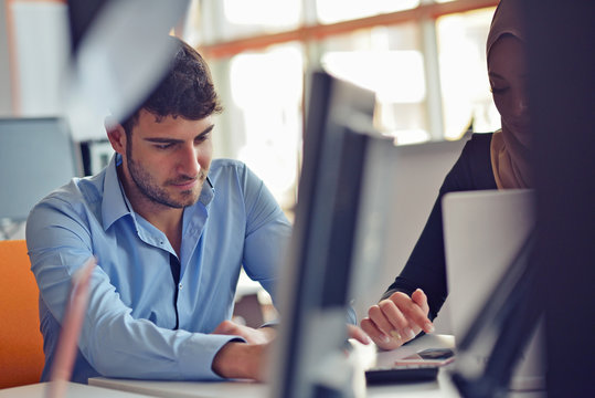 Freelance programmer working in startup office