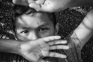 young asian boy feeling Alone and scared