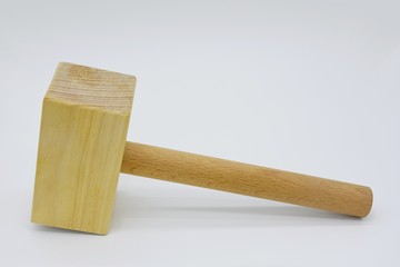 Wooden hammer on white background and copy space.