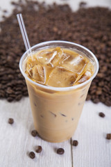 Iced Coffee with ice and a straw