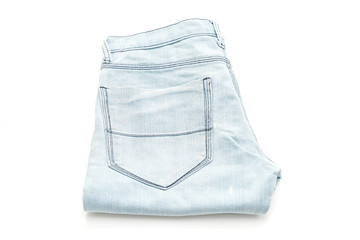 jeans folded on white background