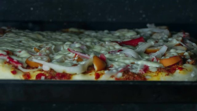 4K Time lapse Pizza baking in oven 