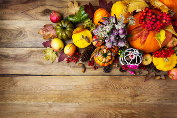 Fall background with pumpkins,and clover flowers, copy space