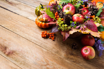 Thanksgiving or fall greeting with apples, rowan berries, copy space