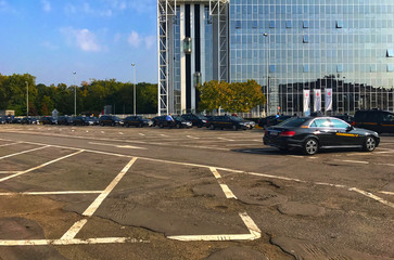 Lot of taxi cars waiting for customers.