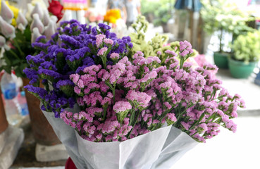 Bunch of colorful statice flower at local store for sell at On Nut, Bangkok, Thailand