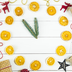 Christmas evening offensive 12 am - a symbol in the form of a clock from dried oranges and fir branches