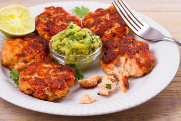 Salmon burgers with avocado salsa. Salmon cakes