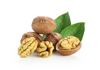 Walnuts with leaves isolated on white background.