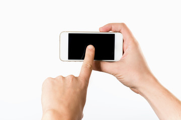 Man hand holding the white smartphone