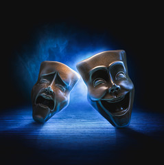 Theater masks on a dark background / 3D Rendering