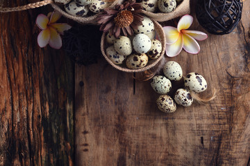 Obraz na płótnie Canvas studio shot of quail eggs on a vintage wooden background.