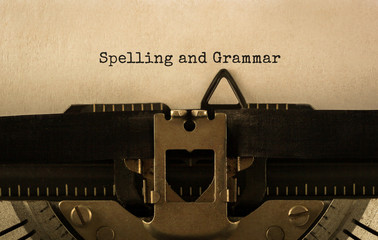 Text Spelling and Grammar typed on retro typewriter