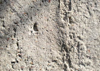 Texture of gray uneven concrete wall. Grunge background