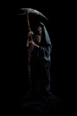 grim reaper with scytheisolated on black / high contrast image