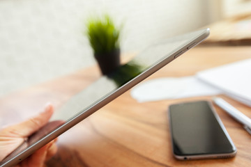 woman is working on tablet