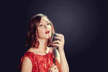 Naklejka premium beautiful young singer