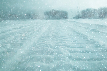 winter road snow tracks