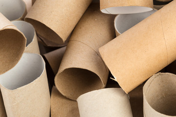 Empty toilet paper on white background