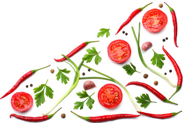 mix red hot chili peppers with parsley and sliced tomato isolated on white background top view