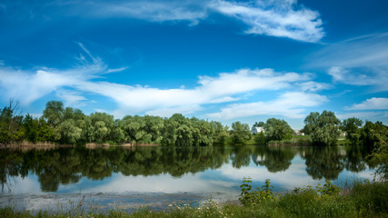 Obraz na płótnie Canvas Ripples on the river at sunny summer day