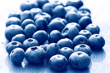 fresh berries blueberries close-up scattered black and white