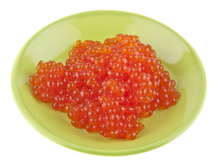 Red caviar in a green plate isolated on a white background