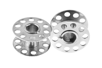 metal reel for threads isolated on white background close-up