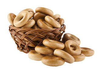 bagels in a basket isolated on a white background close-up