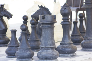 Large outdoor chess board on the grass
