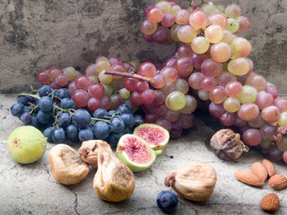 Grapes, figs, almonds still life
