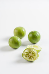 Group of lemons on white table
