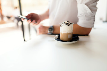 Busy businessman on a coffee break