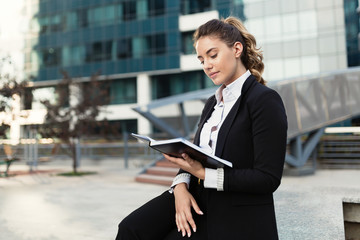 Beautiful businesswoman in business district