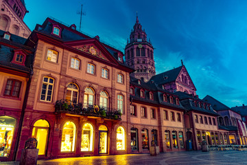 View of the Mainz Cathedral and Markt square at night. Beautiful architecture of old town in night illumination. Mainz, Rhineland-Palatinate, Germany.