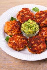 Salmon burgers with avocado salsa. Salmon cakes