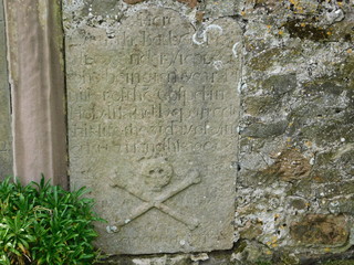 Skull and Cross Bones markings on gravestone on Lindisfarne (The Holy Island)