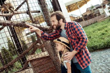 father and daughter in zoo