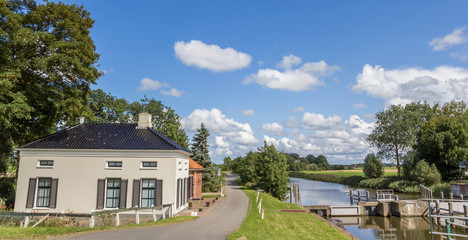 Panorama of an old house at the river in Groningen