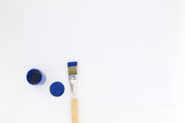 Colorful Paint Brushes with jar paints, in white shots