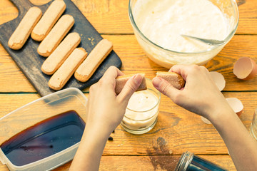Image of wooden table with biscuits, coffee