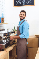 barista making coffee