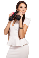 Business woman looking with binocular. Young woman see with binoculars isolated on white background.