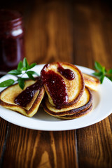 sweet pancakes with raspberry jam